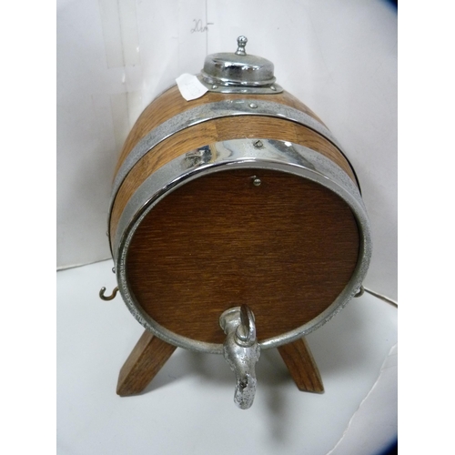 68 - Pair of oak and metal-bound spirit barrels with tap dispensers.  (2)