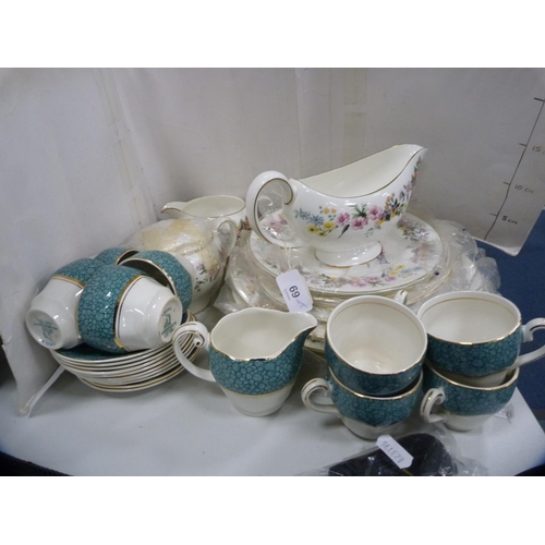 69 - Assorted Wedgwood 'Downland' pattern tablewares including plates, sauce boat, cream jug etc., and a ... 