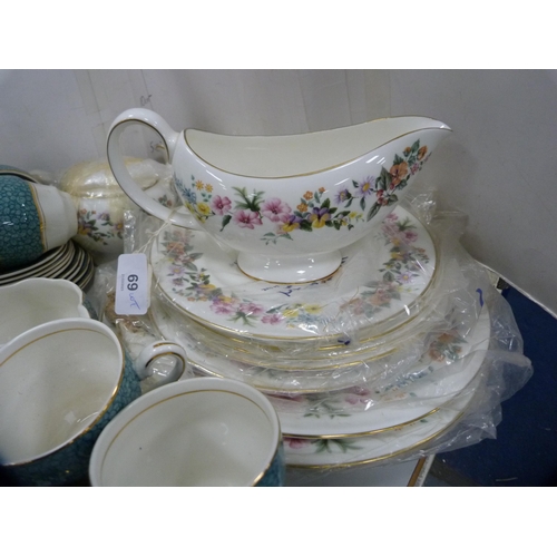 69 - Assorted Wedgwood 'Downland' pattern tablewares including plates, sauce boat, cream jug etc., and a ... 