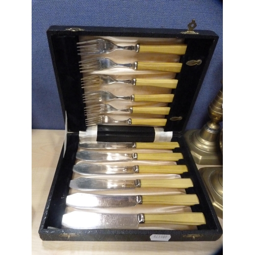 7 - Quantity of EP and brass to include a boxed Walker & Hall three-piece carving set, boxed pair of... 