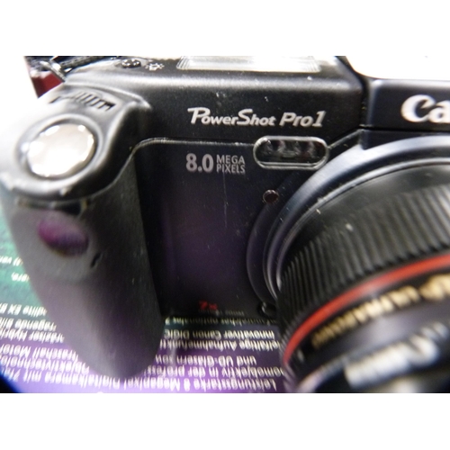 75 - Canon Powershot Pro 1 8MP digital camera with original box.