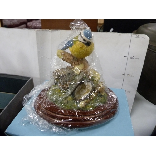 76 - Waterford Crystal figure of an eagle with original box, and a Border Fine Arts group of blue tit, no... 