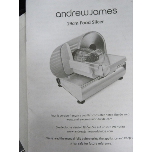 86 - Andrew James food slicer, with original booklet and spare blades.