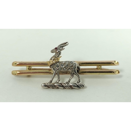 170F - Gold pin with diamond set figure of a stag with ruby eye, '15ct', 3.8g.