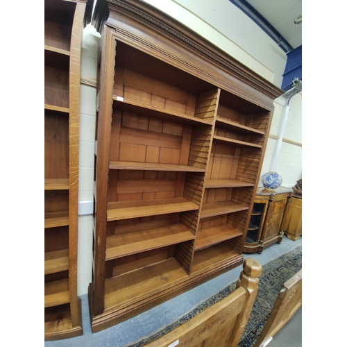 583A - Late 19th / early 20th century large oak open front library bookcase in two sections, with pine back... 