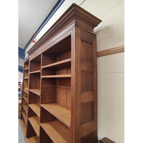 583A - Late 19th / early 20th century large oak open front library bookcase in two sections, with pine back... 