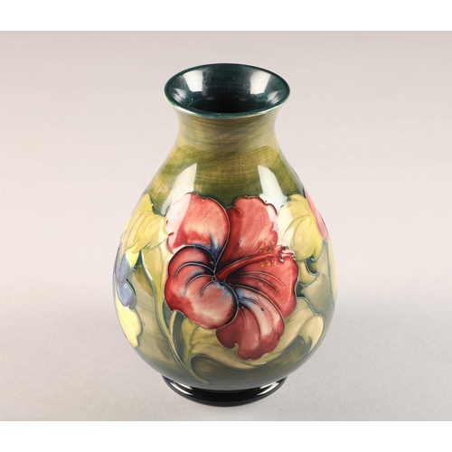 2 - Moorcroft pottery vase, green ground decorated with hibiscus pattern, signed in blue height 21.5cm