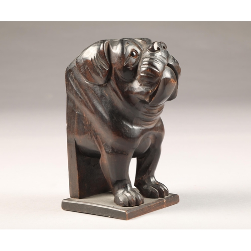 249 - Hardwood carved bulldog figure wall pocket, with applied glass eyes, height 19cm