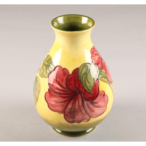3 - Moorcroft pottery vase,  yellow ground, decorated with hibiscus pattern height 21cm