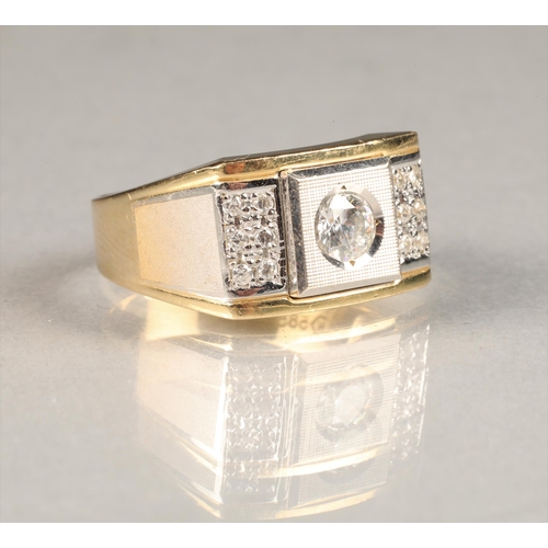 45 - Gents 14 carat yellow and white gold dress ring, central half carat cubic zirconia, flanked by six s... 