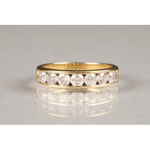 50 - 18 kt gold seven stone diamond ring, channel set with brilliant cut diamonds, approx total diamond w... 