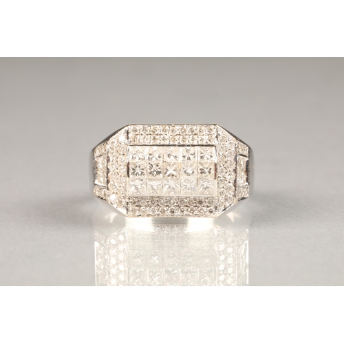 52 - 18 carat white gold gents diamond ring set with, princess and brilliant cut diamonds, approximately ... 