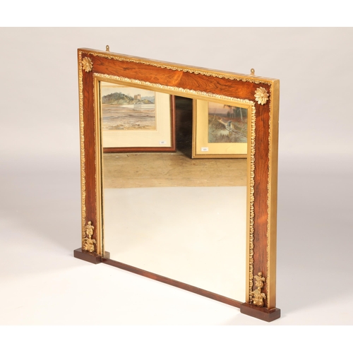 570 - Regency style gilt and rosewood framed overmantel  mirror, with applied flowers, length 100cm