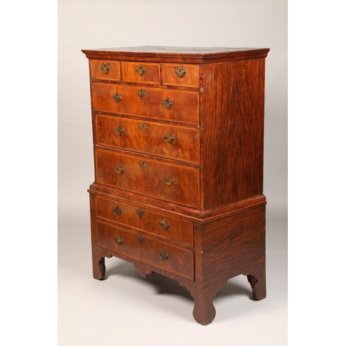 582 - George III walnut chest on stand, three fitted drawers over three deep drawers over two smaller draw... 