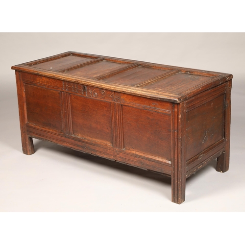 583 - 17th century oak panelled coffer chest, four panelled top, dated 1694, length 135cm, depth 59cm, hei... 