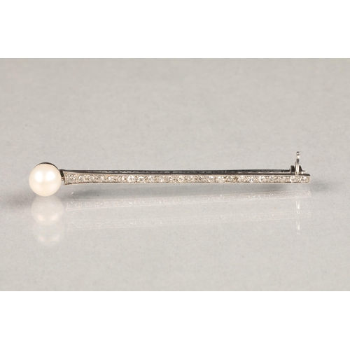 71 - Ladies 18 carat white gold diamond brooch,
row of 24 small diamonds set with a pearl, length 5.5cm