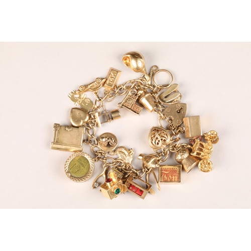 84 - Ladies 9 carat gold charm bracelet, with twenty-six assorted charms, weight 58g