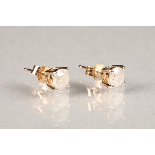 91 - Pair of ladies diamond stud earrings, each stone 0.5 carats set in 9 carat yellow gold