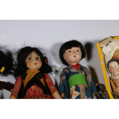 64 - Two Nora Wellings dolls including 'Topsy' and 'Eva', a 20th century doll teacosy, two puppets and ot... 