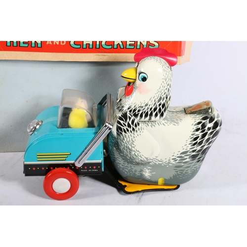 76 - Chinese tinplate battery powered 'Hen & Chickens' automaton toy boxed and an Alps of Japan tinpl... 