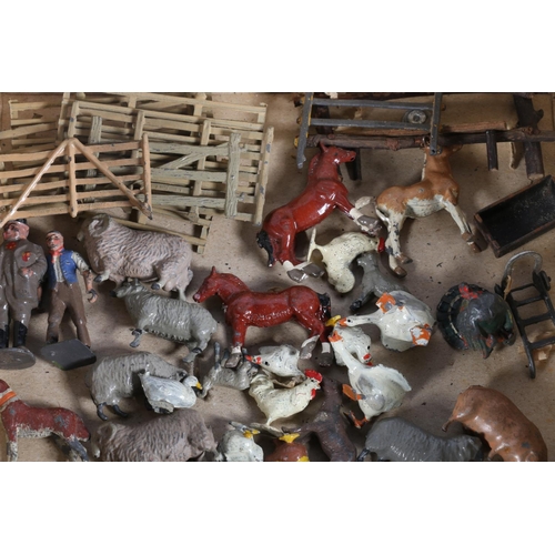 80 - Britains painted lead farm models including farmer, cow, turkey, horses, chickens, wheelbarrow, bird... 