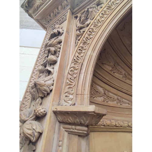 643 - Impressive pair of George III carved pine open corner cabinets, each with foliate carved pediment an... 