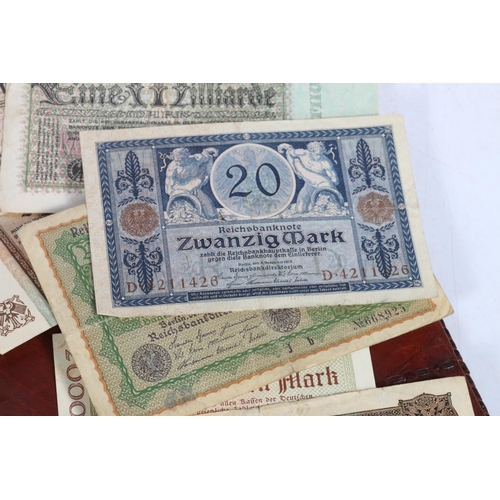GERMANY a large collection of banknotes to include twenty-six 1000 Mark ...