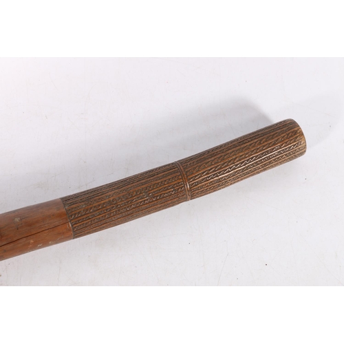 578 - Fijian root wood pole club of Vanikau or Waka Melanesia type with tavatava carved grip, 110cm long.