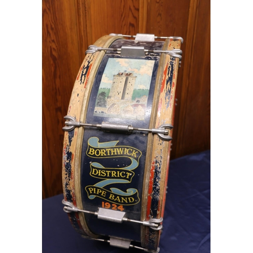 594 - Borthwick District Pipe Band 1924 drum with painted illustration of Borthwick Castle, 78cm diameter.