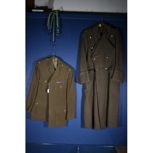 595 - British Army uniform, a WWII era khaki green woollen trench coat with interior pocket label Bernard ... 