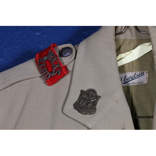 598 - South African Army uniform, a summer jacket with label 'H Carelsen', the epaulettes with WAAS VLHD s... 