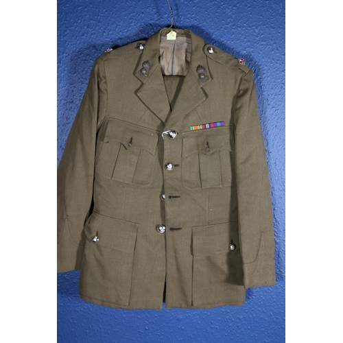 599 - British Army uniform, a black jacket with Alkit of London interior pocket label [B25795 21/6/51 CAPT... 