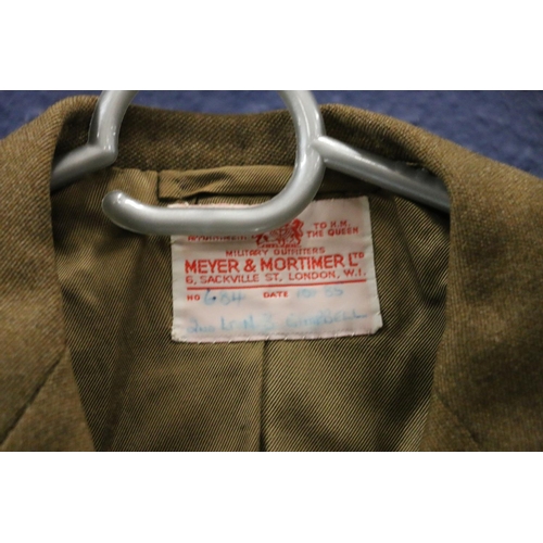 602 - British Army uniform, a khaki green trench coat with Moss Bros of London label having HLI Highland L... 