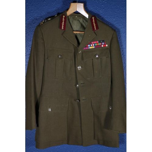 604 - British Army uniform, a British Army khaki green jacket with Bernard Wetherill Ltd of London label 