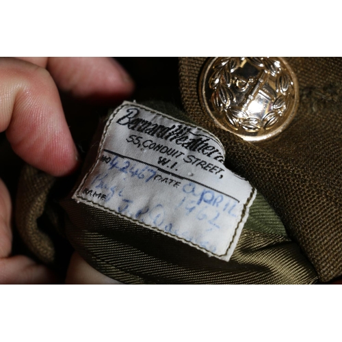 604 - British Army uniform, a British Army khaki green jacket with Bernard Wetherill Ltd of London label 