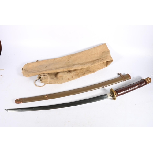 609 - Japanese katana sword with shagreen grip and bronze tsuba, blade length 60cm, sword length 87cm, wit... 