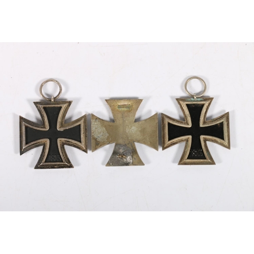 554 - German WWII Black Iron cross 1st class (pin broken) and two others 2nd class. We do not guarantee Ge... 