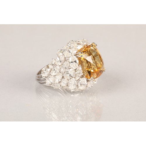 72 - Platinum diamond and citrine ring, set with 42 marquise cut diamonds, total approximately 12 carats,... 