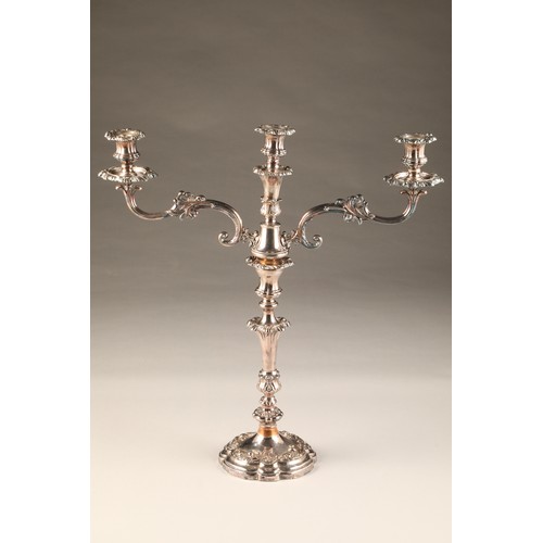 215 - Pair large electro plated sliver three light candelabra, lobed circular based with 
foliate relief, ... 