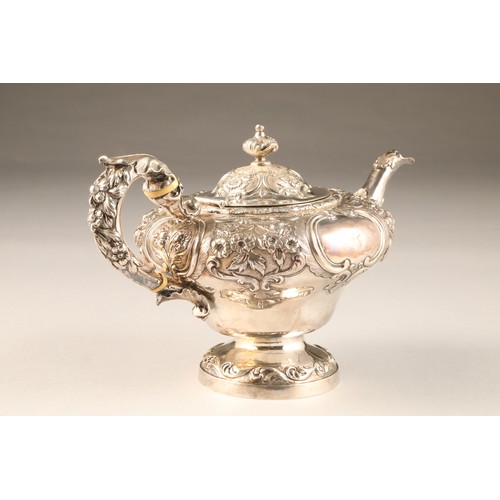 216 - Victorian three piece silver tea service comprising of a teapot, sugar bowl and cream jug, with embo... 