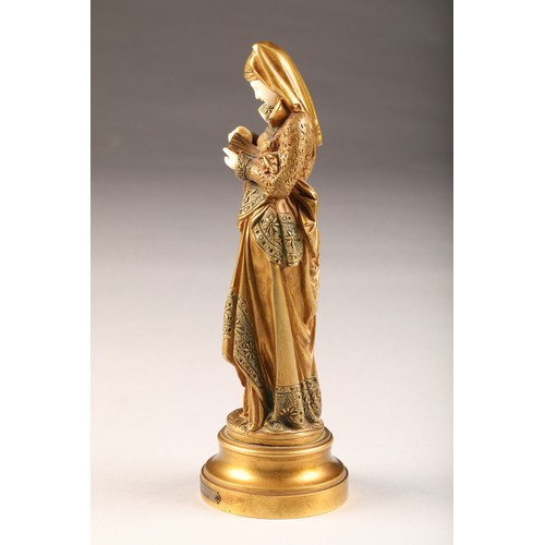 234 - After Albert Carrier - Belleuse (French 1824-1887) gilt bronze figure of a woman reading from a book... 