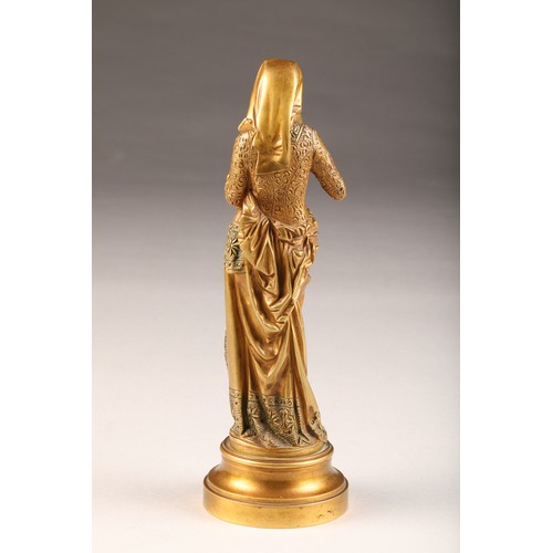 234 - After Albert Carrier - Belleuse (French 1824-1887) gilt bronze figure of a woman reading from a book... 