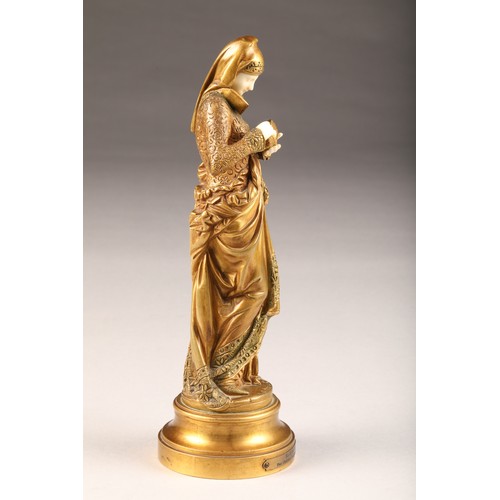 234 - After Albert Carrier - Belleuse (French 1824-1887) gilt bronze figure of a woman reading from a book... 