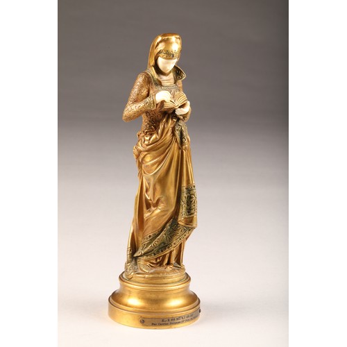 234 - After Albert Carrier - Belleuse (French 1824-1887) gilt bronze figure of a woman reading from a book... 