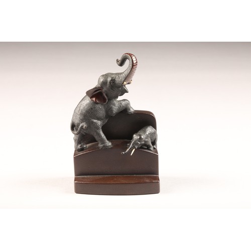 235 - Pair late 19th/20th Century Japanese bronze bookends, stepped form with an applied adult elephant an... 