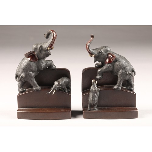 235 - Pair late 19th/20th Century Japanese bronze bookends, stepped form with an applied adult elephant an... 