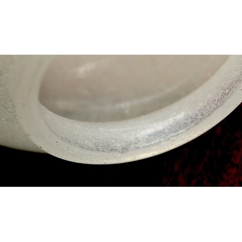 286 - Chinese glass bowl of squat circular form, the snowflake ground with twin carved dark red overlay ha... 