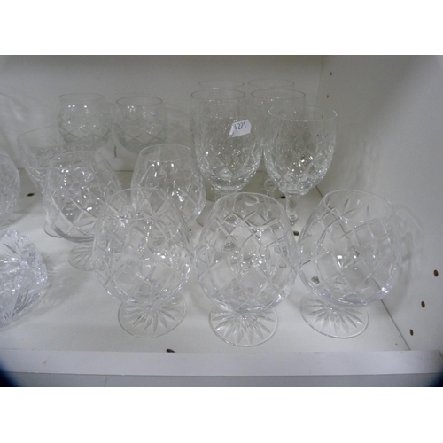 123 - Collection of cut and other glassware including jugs, brandy balloons, sundae dishes etc (one shelf)... 