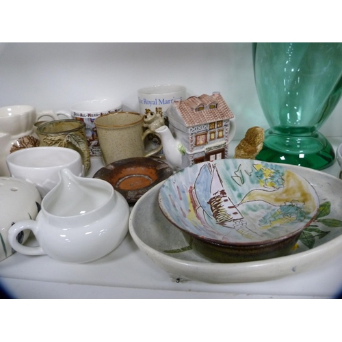 128 - Collection of decorative items including a large glass vase, art pottery jugs, tankards, commemorati... 