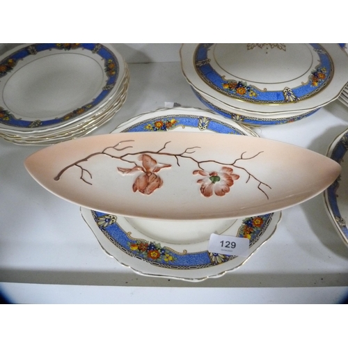 129 - Carlton Ware dish, part dinner service, salad bowl and a barometer (one shelf).